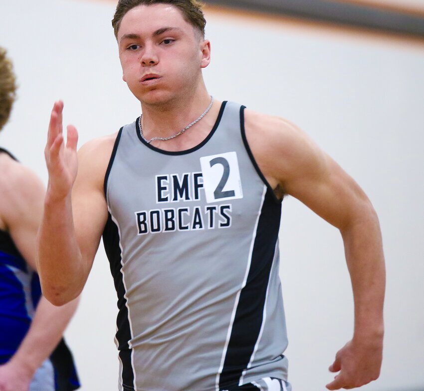 Breckan Schluter of EMF gives it a final push during the 60m dash on March 20.