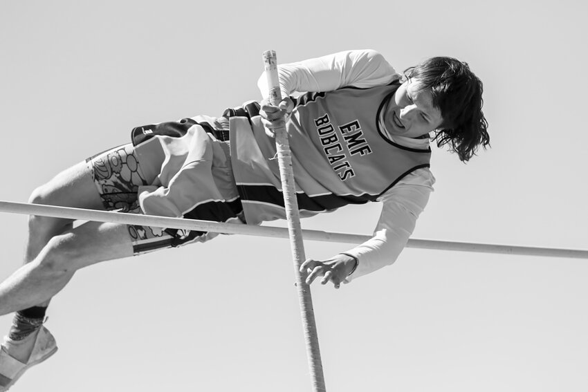 Carver Kanode clears another height in the pole vault at the Deshler Track meet on April 11.
