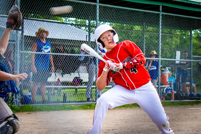 Max Vossler of the Friend American League baseball team moves out of the way of a wild pitch from Plymouth in the league's championship tournament on June 30 in McCool Junction.