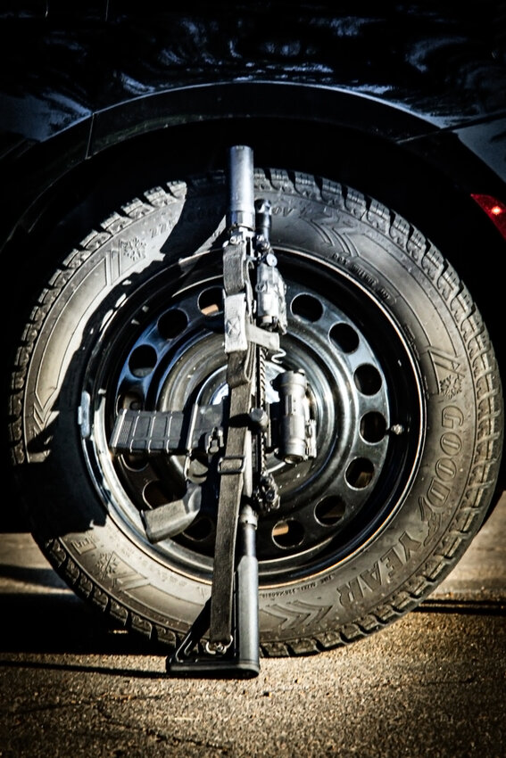 When the shooting incident in Crete was resolved on June 28 law enforcement officers, drenched in sweat, returned to the patrol vehicles, removed their helmets and resecured their weapons including this AR-15 before debriefing at the Crete Police Department.