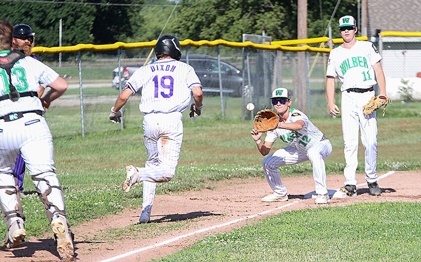 Chase Tachovsky of Wilber gets into position for a rundown against Milford's Justin Dixon July 3. Catcher Brock Young, left, made the throw with Allen Roger (11) backing up the play.