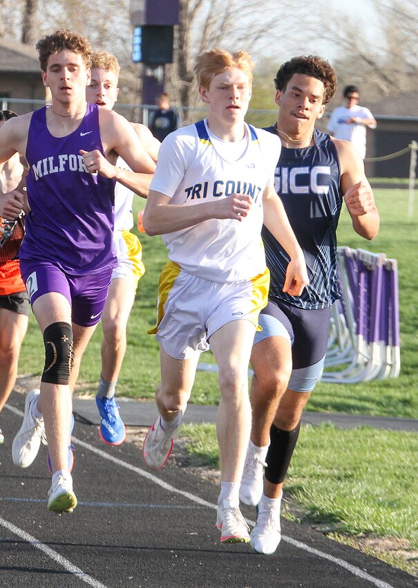 Henry Kapke of Tri County leads the pack down the stretch in the 800-meter run April 11 in Milford. Kapke finished second in the race.