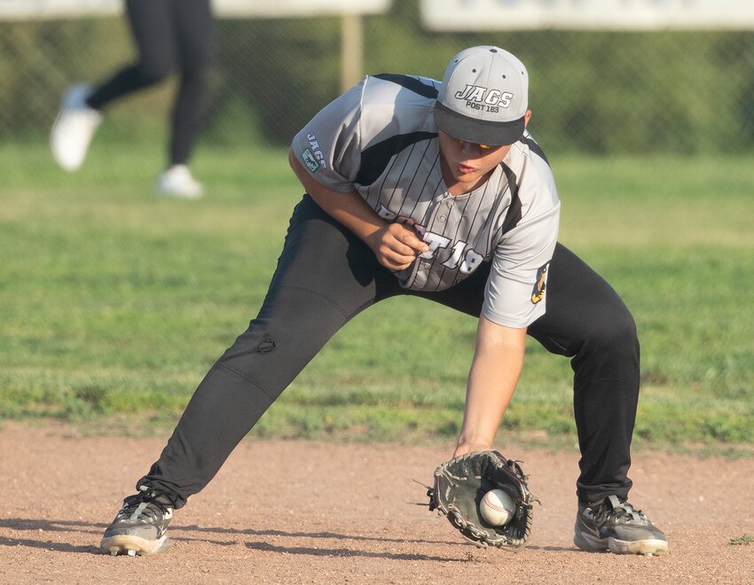 Post 183 infielder Zach Spohn fields a ground ball and throws out the Wilber runner June 16.