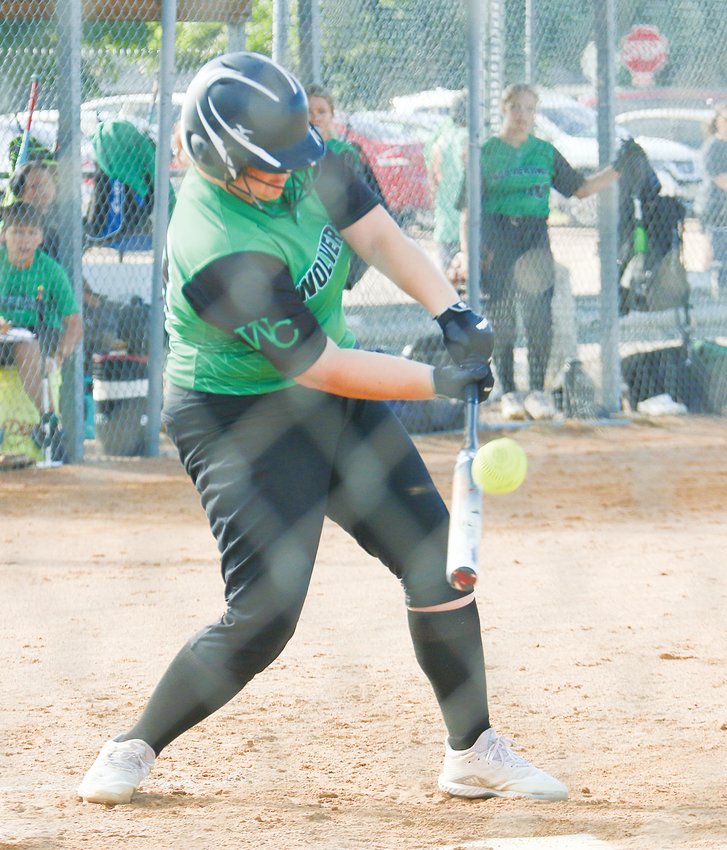 Stephanie Zajicek of Wilber-Clatonia just gets under a pitch against Milford Aug. 20, fouling it off.