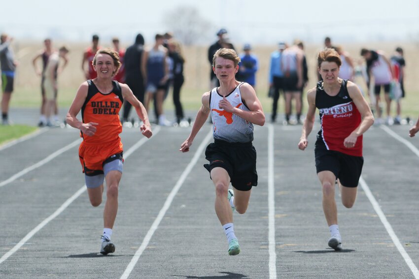 Dorchester's Chase Tachovsky sprints to the finish line during a heat ot the 100-meter dash.