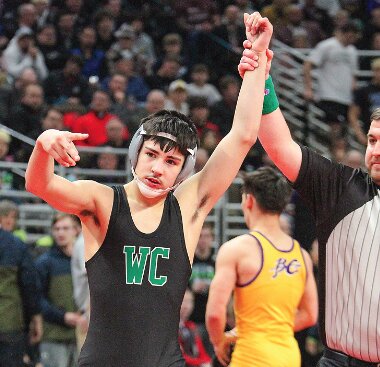Wilber-Clatonia’s Zaiyahn Ornelas holds up two fingers following his championship win over Ayden Wintz of Battle Creek Feb. 17 in Class C at 113 pounds. Ornelas is now a two-time state champion for the Wolverines. See page 6.