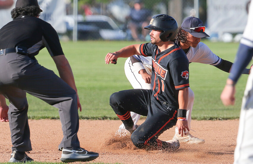 Doane University's Justin Nevells slides safely into second base during the GPAC tournament title game against Concordia University May 7. Doane lost the game 5-1 to finish as conference tournament runner-ups.