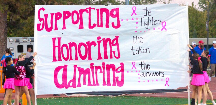 The Crete football team and cheerleaders went pink for breast cancer awareness on Oct. 4.