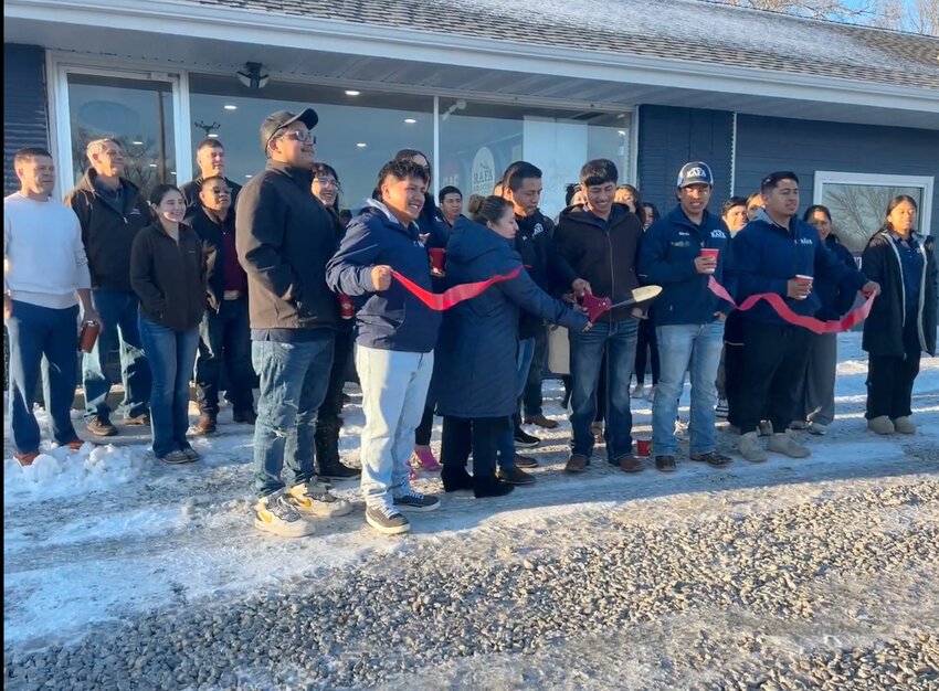 Junior Rafa and Juan Rafa cut the ribbon at their new location in Crete at 705 W. 12 St. in Crete along with members from the Chamber of Commerce.