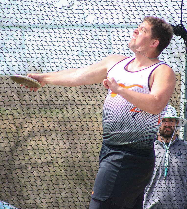 Ella Vyhnalek of Dorchester heaves the shot put at the EMF Invite on April 23.