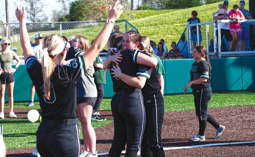 Central Methodist softball players celebrate a pair of wins on Senior Day on April 14. On Saturday, the Lady Eagles extended their winning streak to 26 straight games with a doubleheader sweep at Benedictine College to clinch the Heart regular season title.