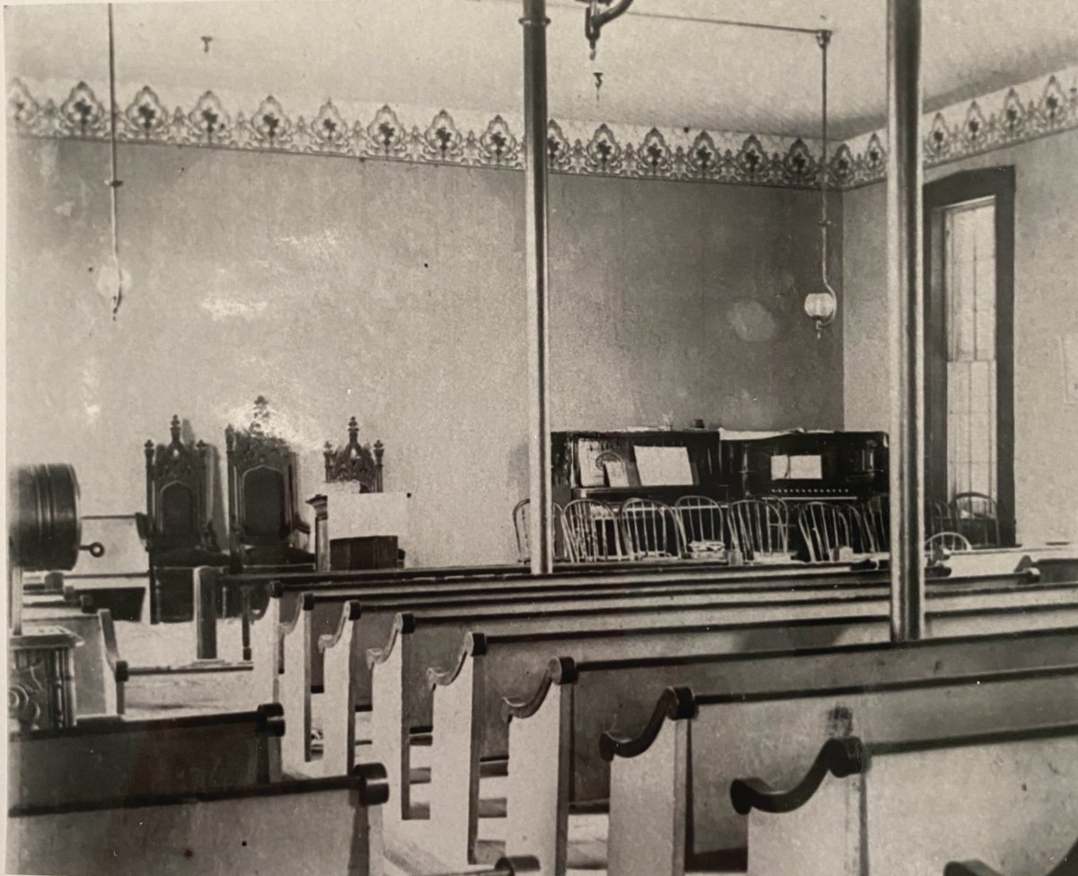 The interior of the original 1866 New Franklin Methodist Church as it appeared in 1906. This building was demolished in 1924 to make way for the current church.