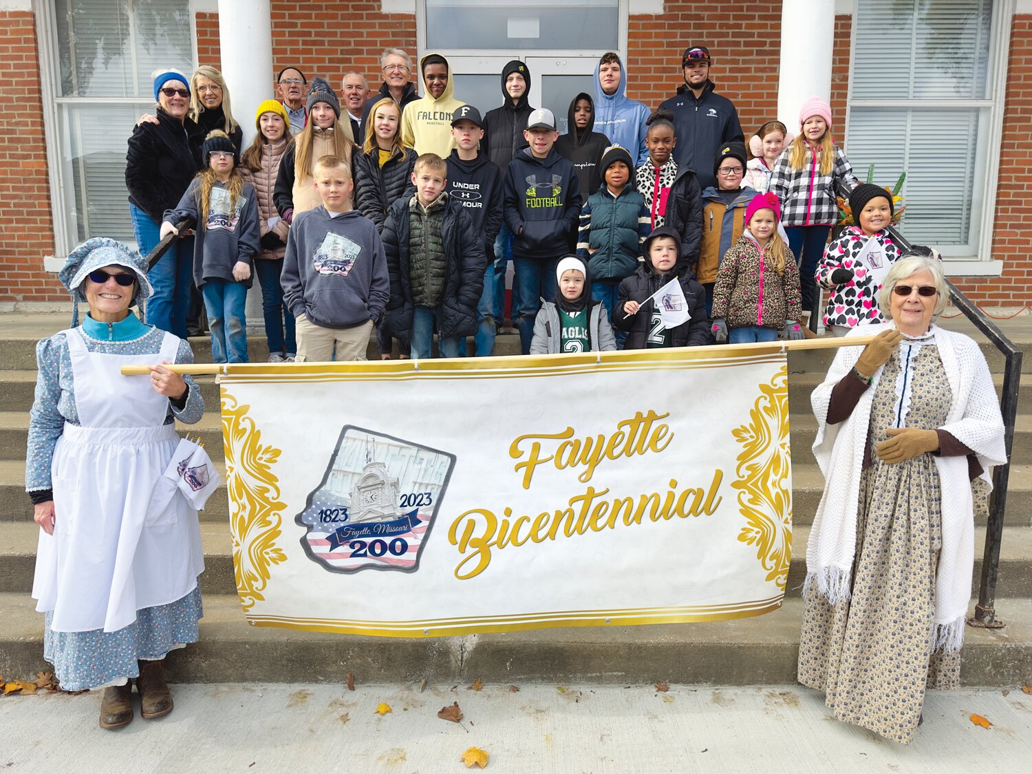 Holding the bicentennial sign are Bekki Galloway and Connie Shay. Ambassadors include Hayden and Maya Kelly, Aven and Alexi Bange, Drew and Chase Vandelicht, Quinton Eubanks, Morgan Bishop, Blakely and Katie Pettit, Quentin Sutton, Julia and Carolyne Young, Aiden Allphin, Aubrey Brush, Glenn Chapman, Liam and Beau Menees, Harper and Oliver Strodtman, and Zachary and Dani Ford. 
Not pictured: Jackson Sutton, Thad Quint, Ben Oeth, Ella Doolin, and McKenna Dodson.
Bicentennial Committee Members include Pat Hilgedick, Michelle Ishmael, Bekki Galloway, Connie Shay, Jamie Page, and Gary Bagby.