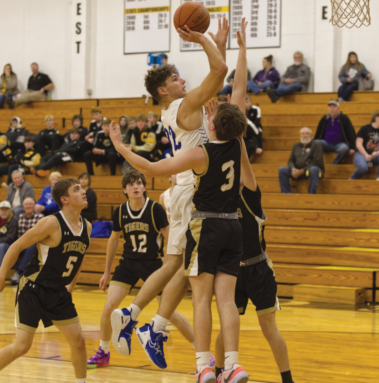 New Franklin’s Drake Clark rises over the Marceline defense. The senior posted a game-high 29 points.