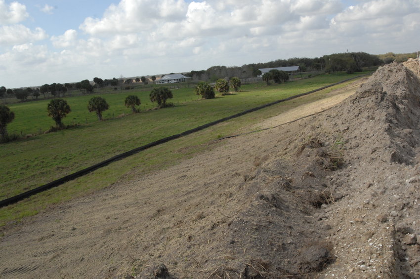 Silt barriers help control erosion from the site.