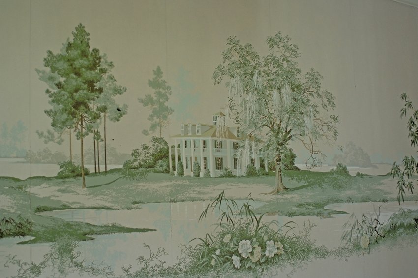 A mural can be seen on the wall in the Pearce family home