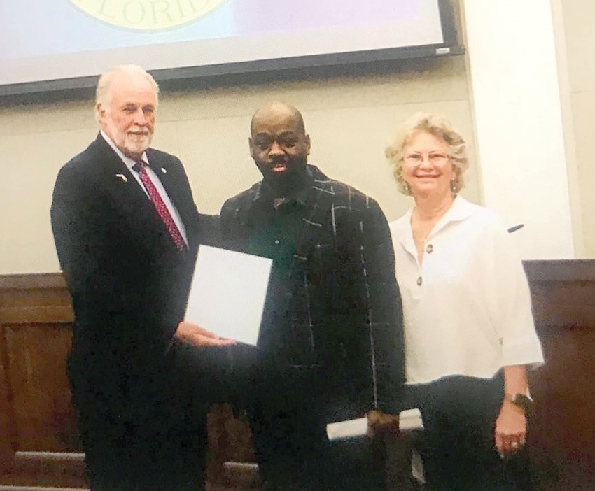 OKEECHOBEE – On May 13, the Board of County Commissioners issued a Proclamation to New Horizons of the Treasure Coast and Okeechobee, designating May 2021 as Mental Health Awareness Month in Okeechobee County. (Left to right) Commission Chair Terry Burroughs presentedWilliam Wims and Debbie Clemons with the proclamation.
