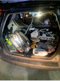 Police image of suspected stolen goods found in Bueno's trunk.