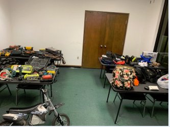Stolen items retrieved from Bueno's vehicle suspected to belong to victims of car break-ins July 15.
