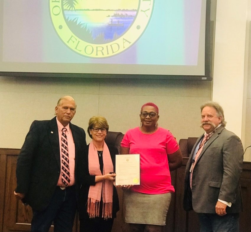 At their Oct. 12 meeting, the Okeechobee County Board of Commissioners proclaimed October as Breast Cancer Awareness Month. Left to right are Commissioner David Hazellief, Commissioner Kelly Owens, Kantrel Smith and Commissioner Brad Goodbread.
