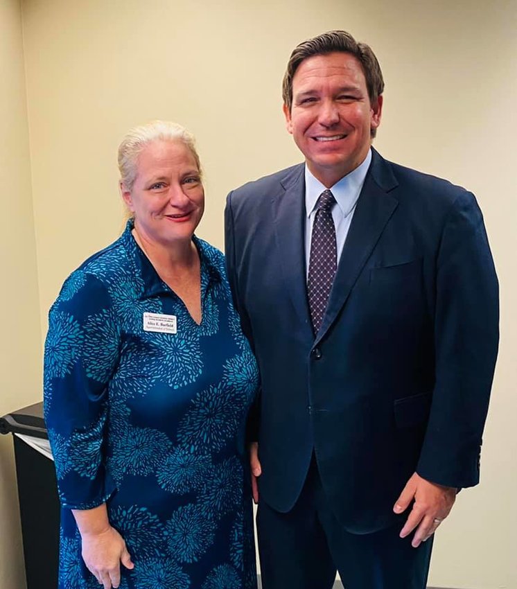 Glades County Superintendent of Schools Beth Browning Barfield is pictured with Gov. Ron DeSantis