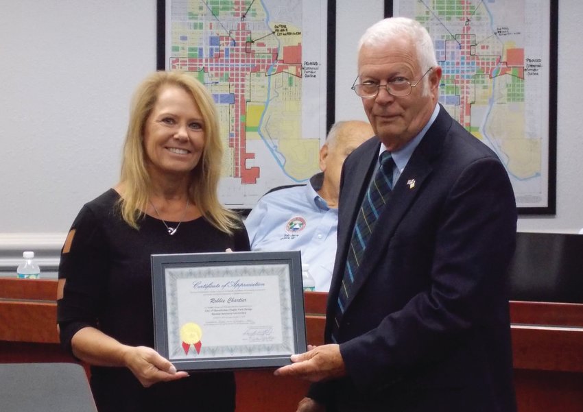 Mayor Watford presented Flagler Park Design Review Advisory Committee Chairperson Robbie Chartier with a Certificate of Appreciation. Thank you for your hard work and time helping to improve our City! Pictured left to right: FPDRAC Chair Robbie Chartier, Mayor Dowling Watford