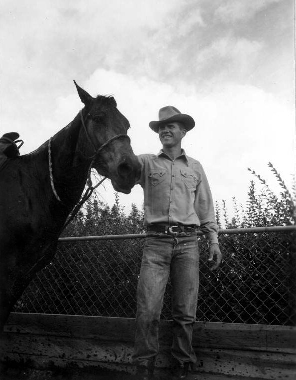 Pete Clemons and his horse at a rodeo in Lakeland in 1947