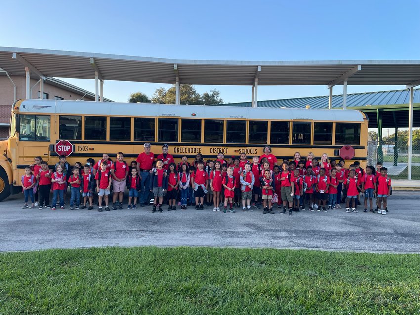 Central Elementary School students from bus 1503 proudly wear their red shirts in support of Red Shirt Friday.
