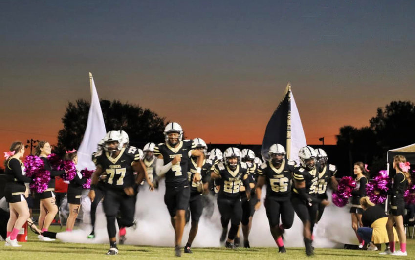 The Terriers take the field. [Photo courtesy Moore Haven Middle-High School]