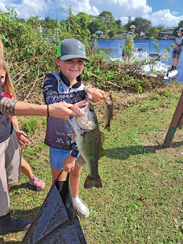 Katie Fender took first place in the 9-13 age group with 13.75 lbs. [Photo courtesy Big O Teen Anglers]