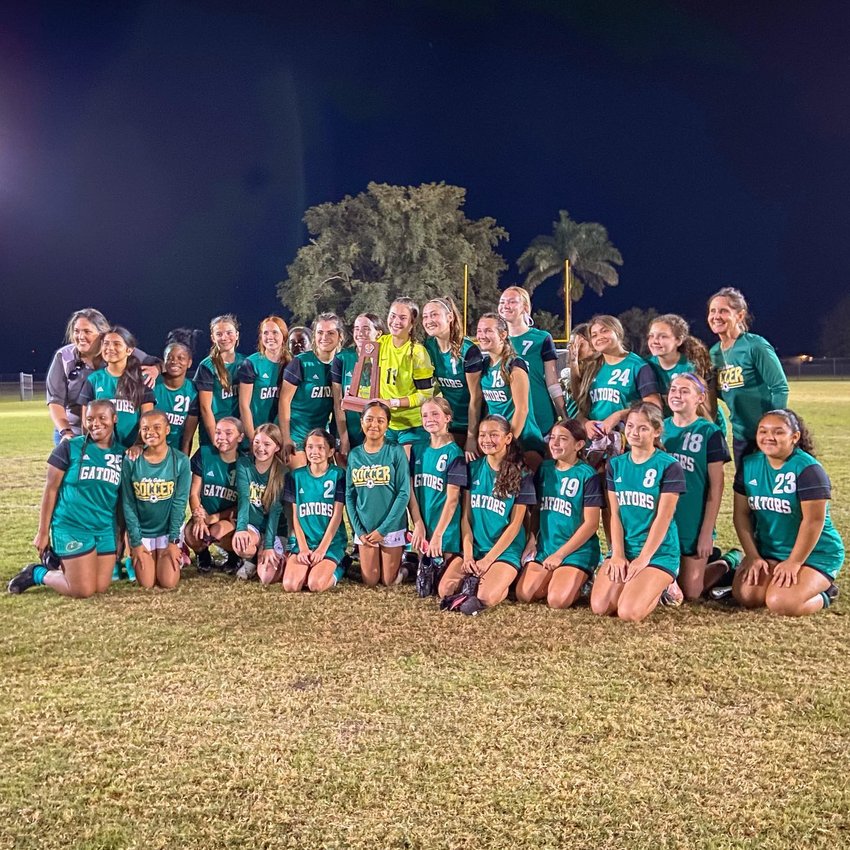 The Lady Gators shortly after defeating Berean Christian in the district championship. [Photo courtesy Glades Day School/Lake Okeechobee News]