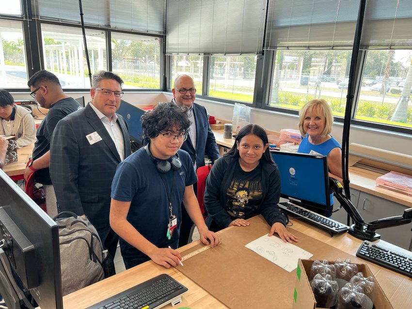 Immokalee Foundation Engineering & Construction Management Pathway students Salvador V. and Katherine C. with KeyBank’s James A. Bitonte, Michael T. Schneider and Karen Crane