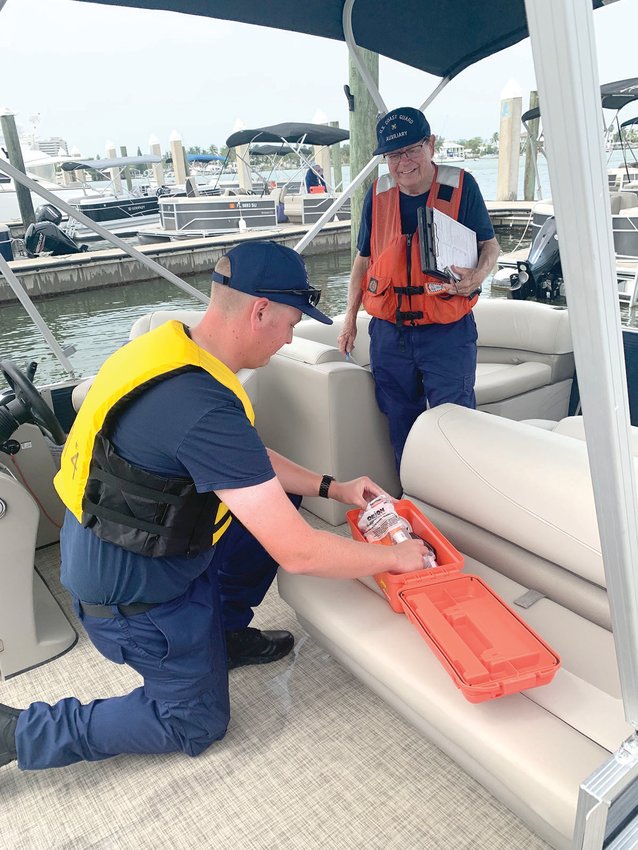Vessel Safety Check Booth at a local marina. [Photo courtesy US Coast Guard]