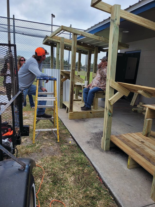 W&W donated all materials to make four score keeper stands, and volunteers came together to build them.
