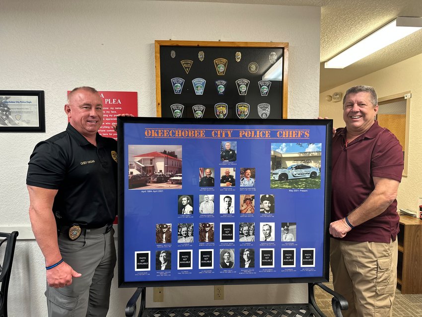 Former Okeechobee City Police Officer Larry Parzygnat assembled a collage of the former police chiefs and other historical photos. On Wednesday, April 12, he presented to Chief Donald Hagan on behalf of the department. It will be hung and displayed in the department lobby.