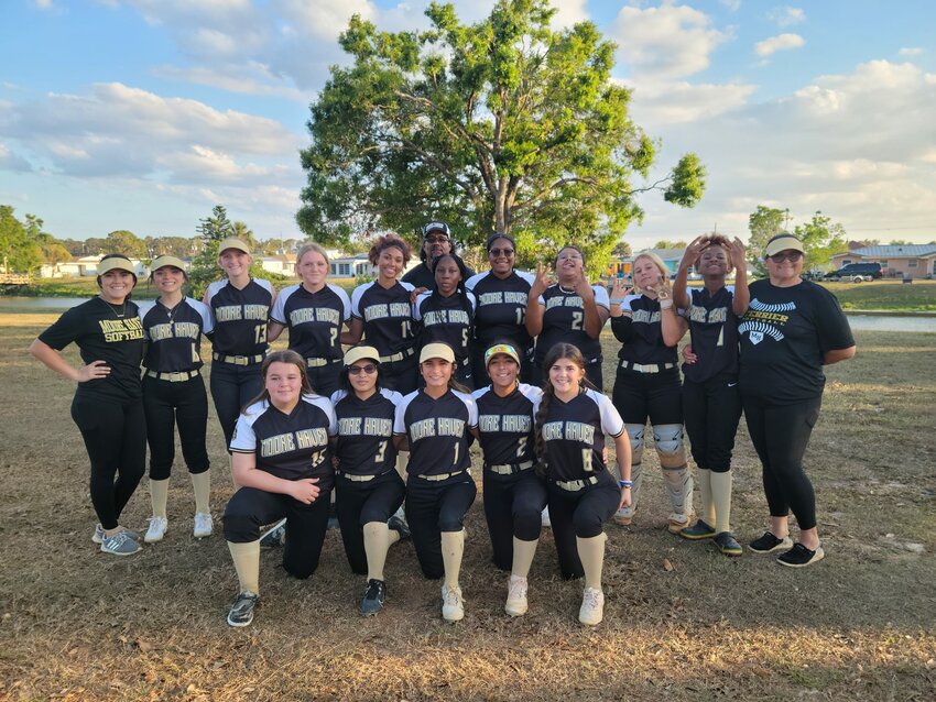 The Lady Terriers pose after their win over Family Christian Academy on March 30. [Photo courtesy Moore Haven Athletics/Lake Okeechobee News]