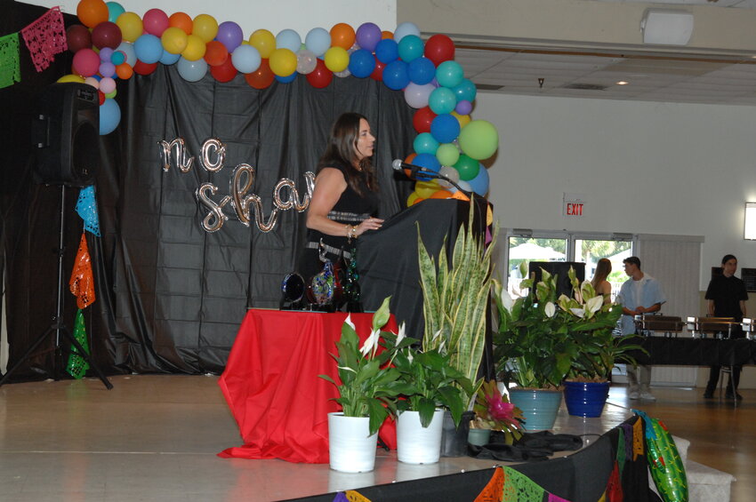 OKEECHOBEE -- Erin Alcalay, an Our Village partner, was one of the speakers at the dinner.