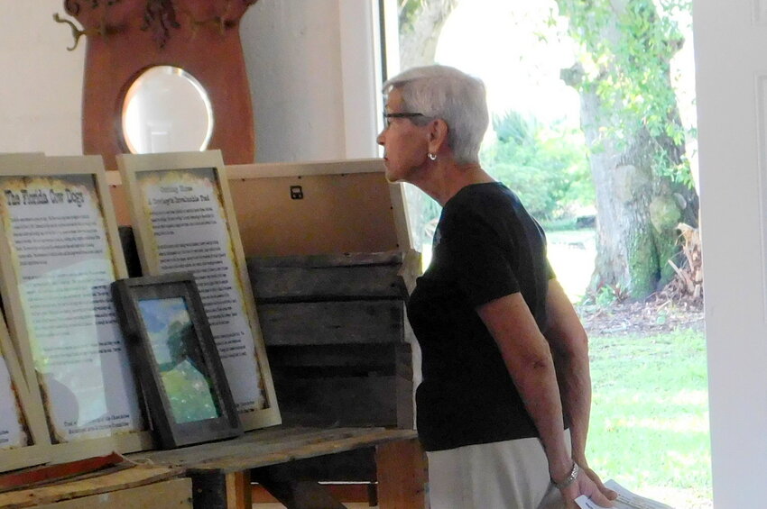 Raye Deusinger admires some of the artifacts at the museum.