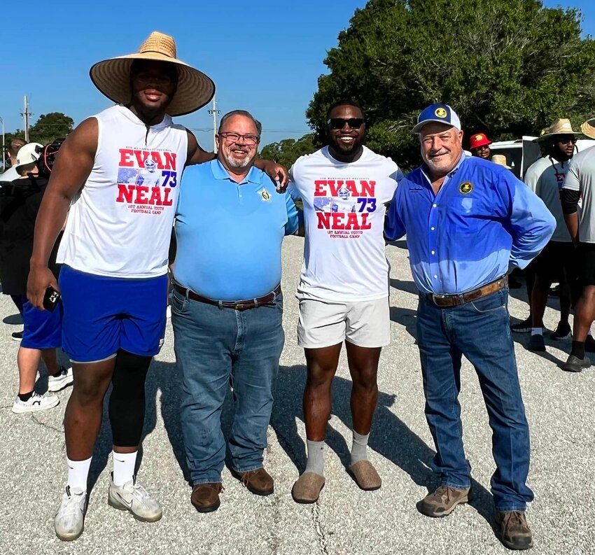 Evan Neal (left) is pictured with Sheriff Noel E. Stephen, Lonnie Pryor and County Commissioner Frank DeCarlo.