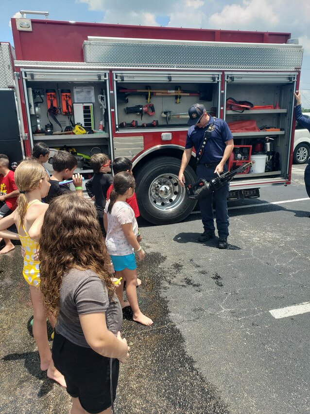 There's not much better to do in the summer time than play in a sprinkler. Especially when that sprinkler is provided by your friendly neighborhood firefighters! We love visiting our local kids at camp!