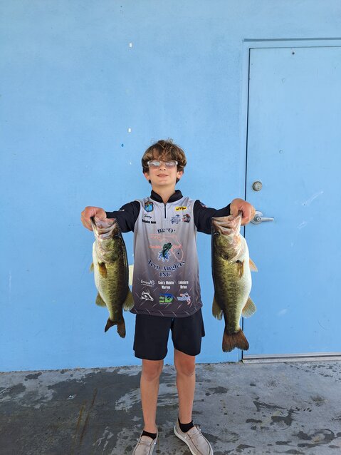 Jeremy Llorens placed third in the 9-13 age group with 7.20 lbs.