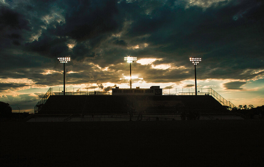 The silhouette of Okeechobee High School football stands.