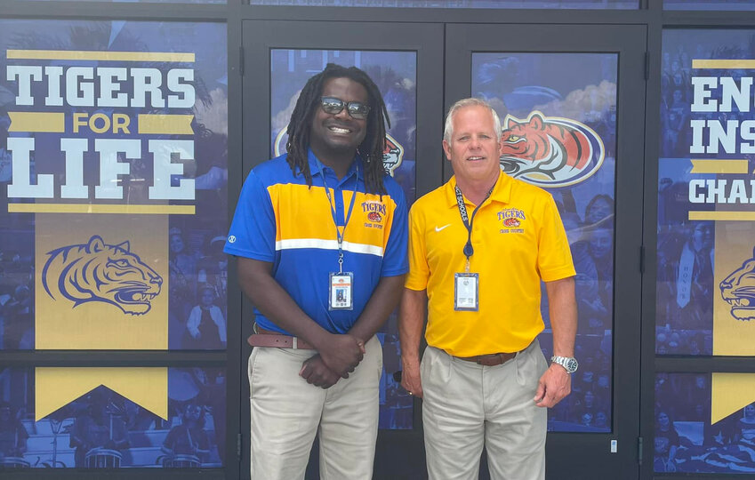 Cross country coach Jay Similien and Clewiston athletic director Pete Walker. (photo courtesy CHS Athletics)
