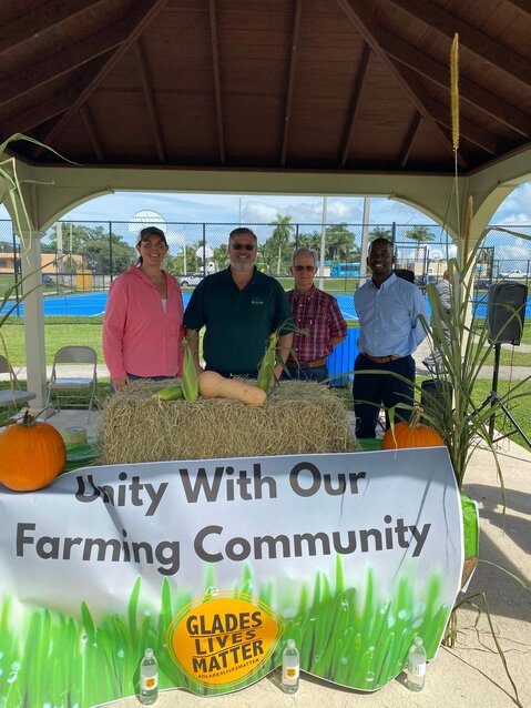 SOUTH BAY -- Glades community members gathered for the Preharvest Blessing on Sept. 29. Farmers at the event included (left to right) Kiley Harper-Larson, Stephen Basore, Frank Dowdle, and Brannan Thomas.