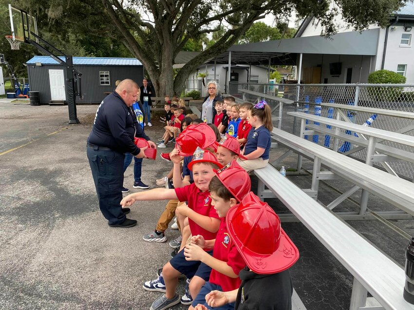 During Fire-Safety week, OCFR visits area schools. Pictured are students from OCA>