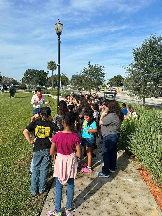 The 4th graders from Central Elementary visited Cattlemen's Square as part of their unit on the book Land Remembered by Patrick Smith. Hosted by the Okeechobee Historical Society, the students listened to presentations by Brad Phares and Dowling Watford about the history of cattle and Florida cowboys.