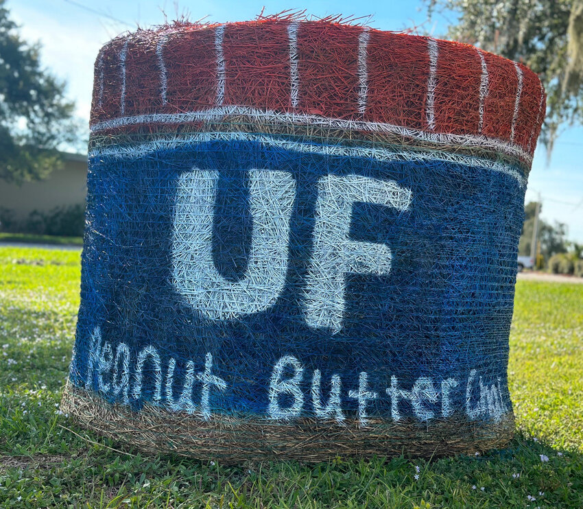 Hay bale in Highlands County decorated to support the UF Peanut Butter Challenge.