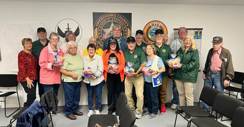 During the meeting this morning, members of the Citizen Observer Patrol created baskets for the individuals they regularly visit on our "RU-OK" checks. 
It's often overlooked how much work these amazing individuals do during their patrols. The program mentioned in the text above is responsible for checking on those older folks in Okeechobee whose families have requested regular visits. 
Volunteers on patrol check on homebound individuals, often forming lifelong friendships.
If you need more information about the RU-OK check or the COP Program, please contact Sergeant Jack Nash at 863.763.3117, extension 5018.