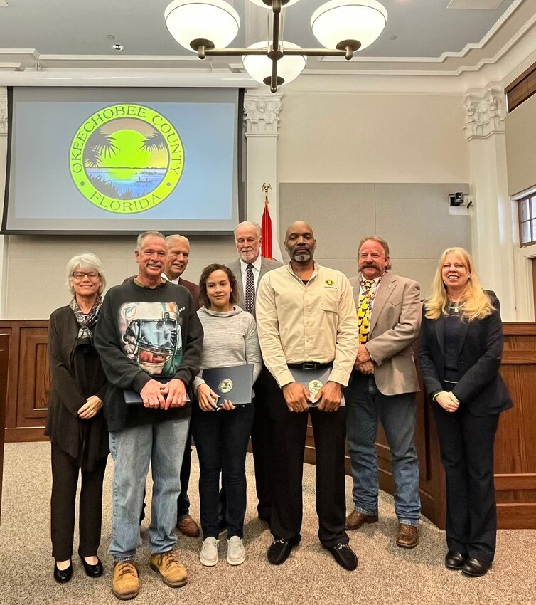 OKEECHOBEE -- At their Jan. 11 meeting Okeechobee County Commission honored employees for their years of service. Left to right are Commissioner Kelly Owens, David Triplett, Diana Molina-Crespo, Commissioner Terry Burroughs, Roy Griffin, Commissioner Brad Goodbread and Administrator Deborah Manzo. Not pictured are Abrahman Barrera and Pat Hogue.