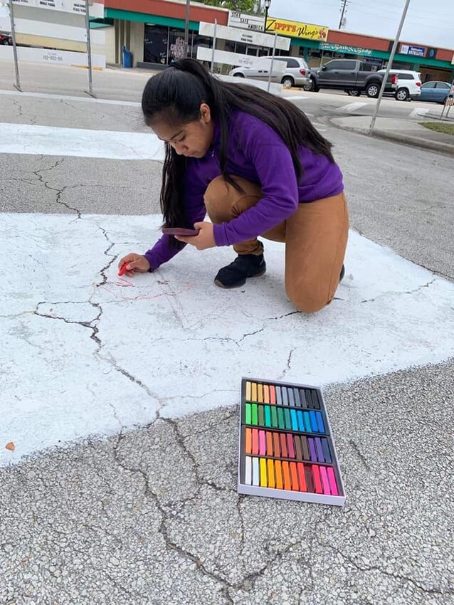 Miria Mendez was one of the chalk artists who painted during last year's art festival.